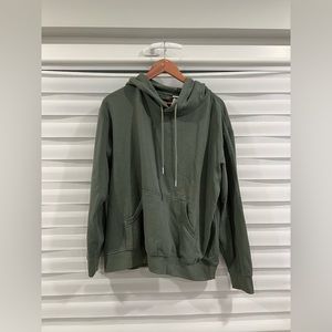 H&M Green hooded sweater in size medium
